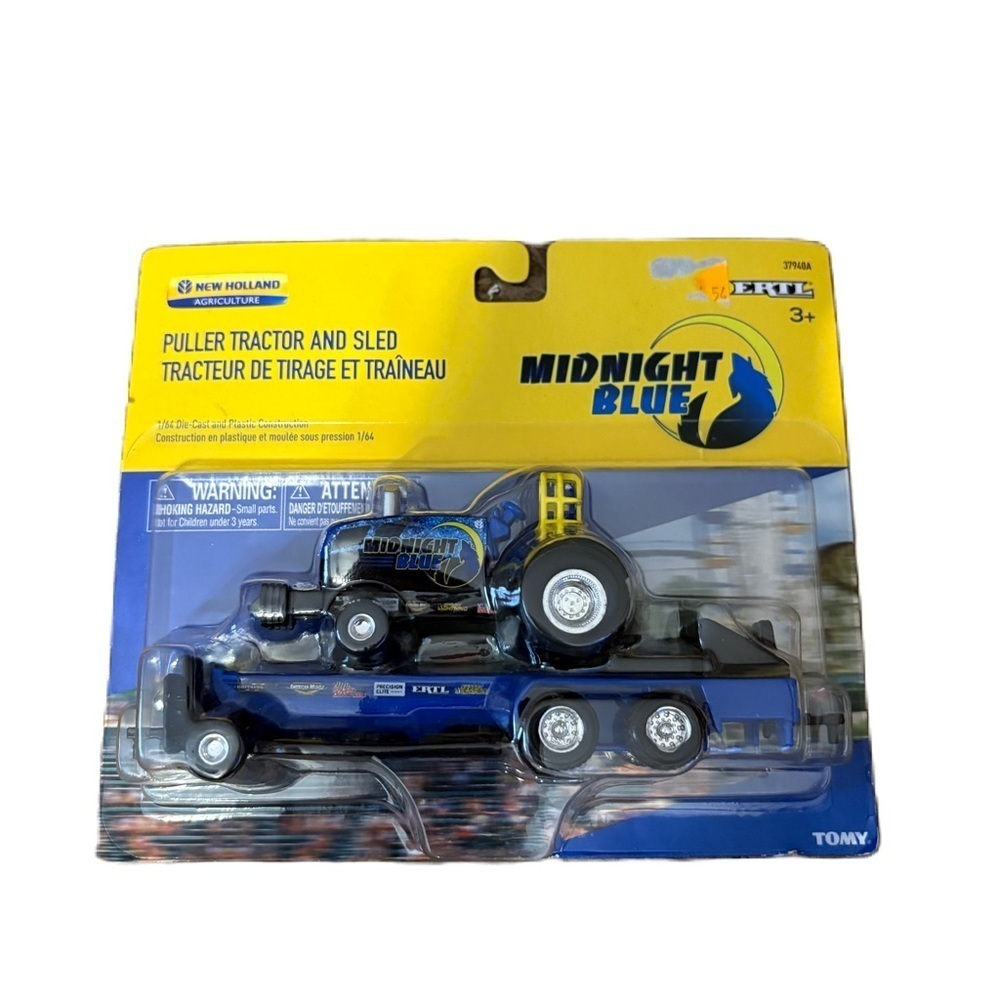 ERTL 1:64 NEW HOLLAND MIDNIGHT BLUE TRACTOR PULLER NEW Pulling Sled Toy Diecast